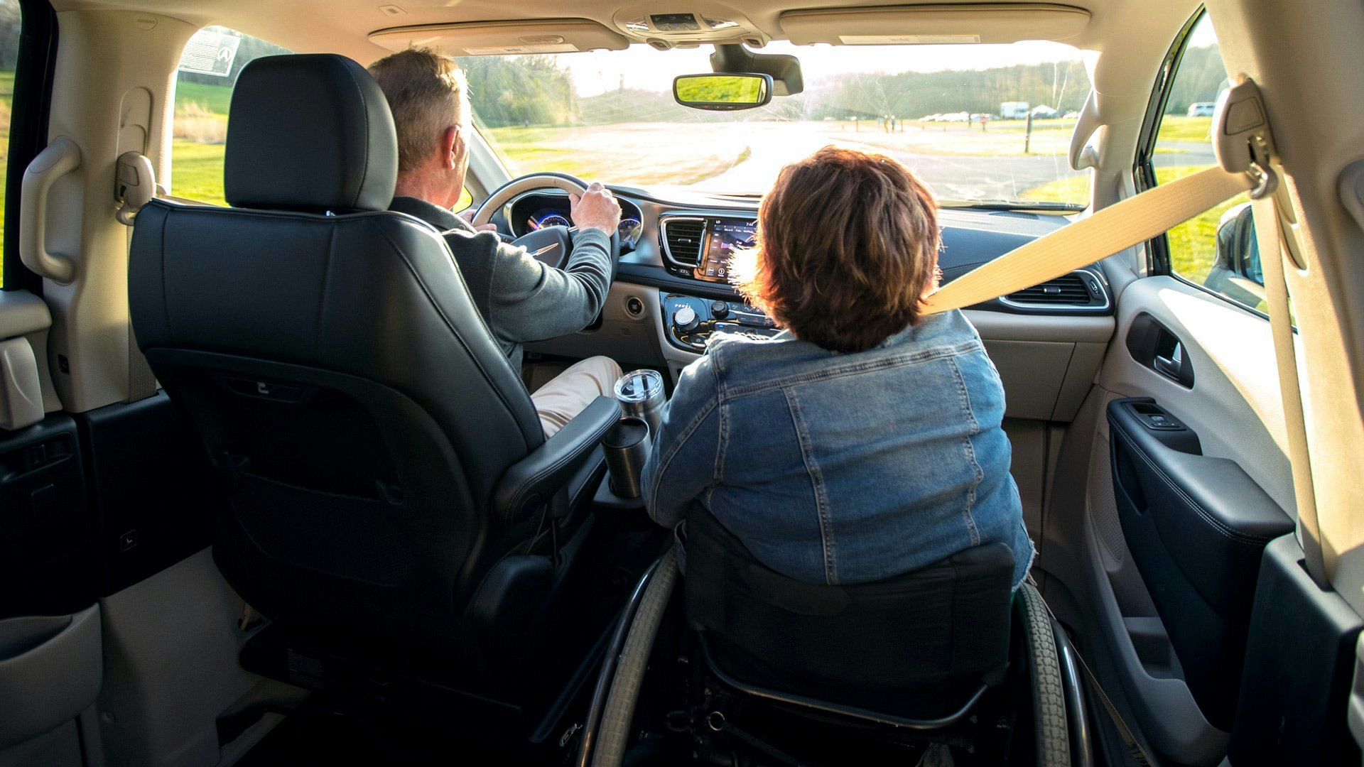 inside a wheelchair mini van looking from the backseat forward
